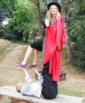 Sam Savill ein PhD graduation gown